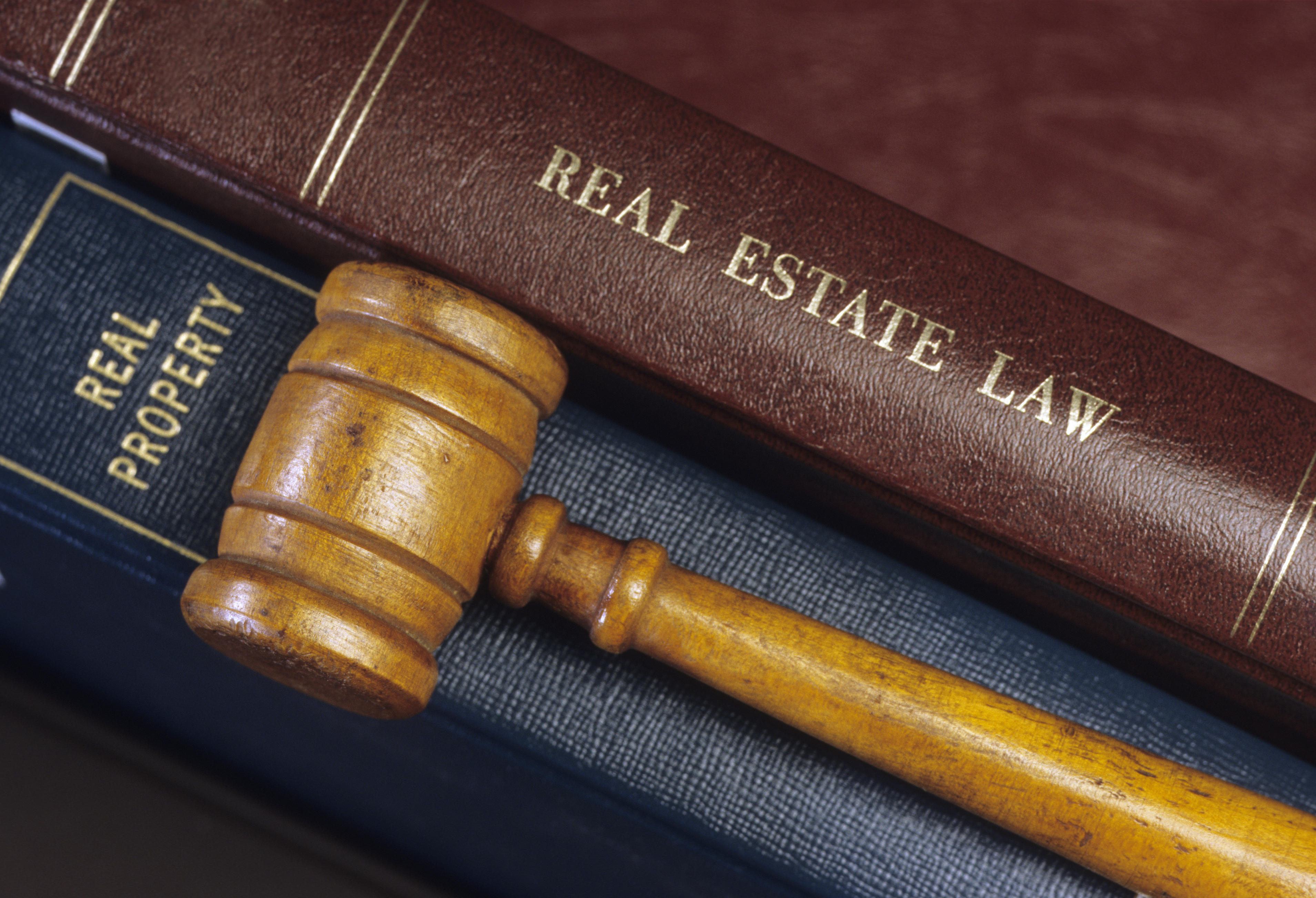a%20gavel%20on%20real%20estate%20law%20books